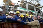 President Lula greets workers during a visit to Petrobras' production unit in the city - Brazil.