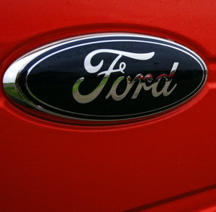 The Ford logo is seen at a Ford dealership in Hudson, Wisconsin