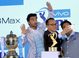 Alex Feng, CEO of VIVO India, taking a selfie with actor Ranveer Singh and IPL Chairman...