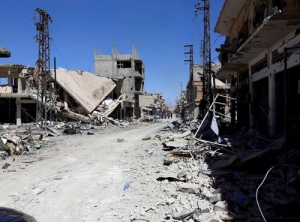 Ruins are seen at al-Qaryatain city in the central city of Homs, Syria on Monday...