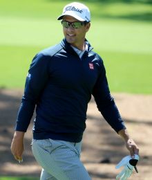 Warming up for the big event: Jason Day and Adam Scott.