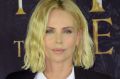 It's hard being beautiful according to someone who should know, Charlize Theron.