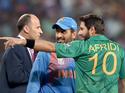 Skippers Shahid Afridi (left) and M. S. Dhoni (centre) seem to be sharing a lighter moment ahead of the toss. The men in blue got the better of their archrivals in a World Twenty20 game yet again. They are now 11-0 against Pakistan in world events.