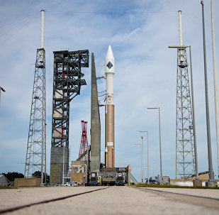 The United Launch Alliance Atlas V rocket with Orbital ATK’s Cygnus spacecraft onboard is seen shortly after arriving at Space Launch Complex 41 on December 2, 2015