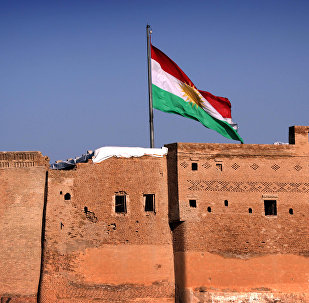 A picture taken on February 3, 2016, shows the Kurdish flag flying over the Arbil Citadel, in the capital of the autonomous Kurdish region of northern Iraq