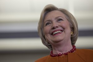 Democratic presidential candidate Hillary Clinton smiles as she is introduced at a campaign event, Saturday, April 2, 2016, in Eau Claire, Wis.