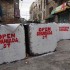 Anti-occupation murals on military blockade