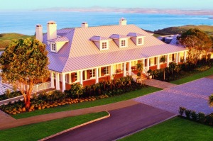 Kauri Cliffs Lodge at sunset.