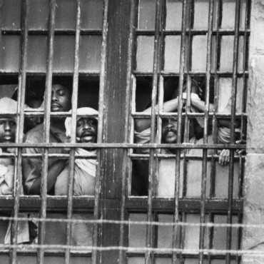 Inmates shout to reporters during a prison rebellion in Washington, DC in 1972. DC Public Library