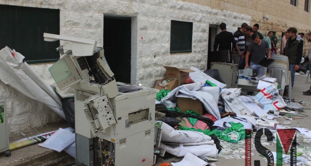 Destroyed items from the Tuesday morning raid gathered outside the rooms