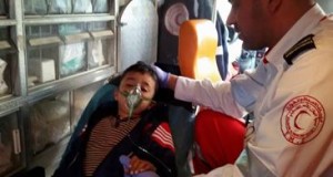 Young boy that was playing in park receiving treatment