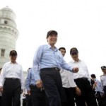 Taiwan's President Ma Ying-jeou, center, leaves a lighthouse during his visit to Pengjia Islet in the East China Sea Saturday