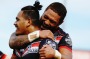 Bear hug: Solomone Kata celebrates after scoring with Manu Vatuvei.