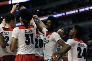 West forward Josh Jackson, second from right, from Justin-Siena in Napa, Calif. stands with teammates during the McDonald's All-American boys basketball game, Wednesday, March 30, 2016, in Chicago. The West beat the East 114-107.