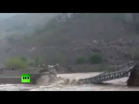 Bridge swept away by flash floods in Pakistan