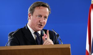 File - British Prime Minister David Cameron speaks during a media conference after an EU summit at the EU Council building in Brussels, on Friday, Oct. 24, 2014.