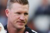 Owning up: Nathan Buckley leaves after giving his team advice during the three-quarter time break.