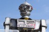 A robot distributes promotional literature calling for a ban on fully autonomous weapons in London's Parliament Square ...