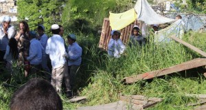 Settlers and their children trespassing illegally on Palestinian land.