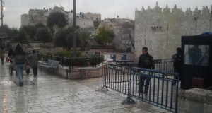 Israeli police stand on both sides of the Damascus Gate exit, in the Palestinian neighborhood.