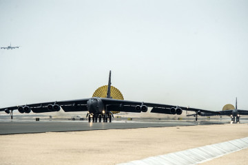 U.S. Air Force B-52 Stratofortress aircraft from Barksdale Air Force Base, Louisiana, arrive at Al Udeid Air Base, Qatar, April 9, 2016. (U.S. Air Force photo by Tech. Sgt. Nathan Lipscomb/Released)