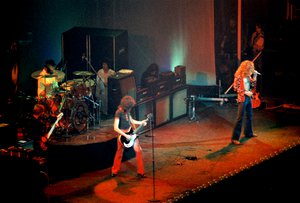 File - Led Zeppelin performing at Chicago Stadium in 1975.