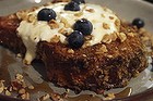 Textural wonder: Crunchy brioche French toast with blueberries, yoghurt, roasted pecans and maple syrup.