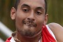 Feeling good: Nick Kyrgios fires a return to Tim Smyczek at the Miami Open.