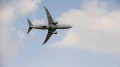 A P-8 Poseidon flies over the 2013 Dubai Airshow at the Dubai World Central Airport in Jebel Ali, United Arab Emirates, Nov. 20, 2013. (Photo by Bahja J. Jones, U.S. Air Force)