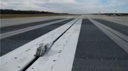 The Electromagnetic Aircraft Launch System shuttle readies for testing at the Naval Air Systems Command EMALS test site, located at Joint Base McGuire-Dix-Lakehurst, New Jersey. (Navy photo)