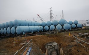 File - Water tank at the Fukushima Dai-ichi nuclear power plant in Okuma, Fukushima prefecture, northeastern Japan, Wednesday, Nov. 12, 2014.