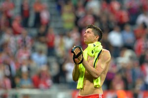 Bayern's Robert Lewandowski reacts after failing to advance to the final after the soccer Champions League second leg semifinal match between Bayern Munich