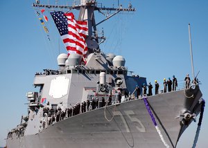 Sailors man the rail as USS Donald Cook (DDG 75) returns to Naval Station Norfolk following a seven-month deployment.