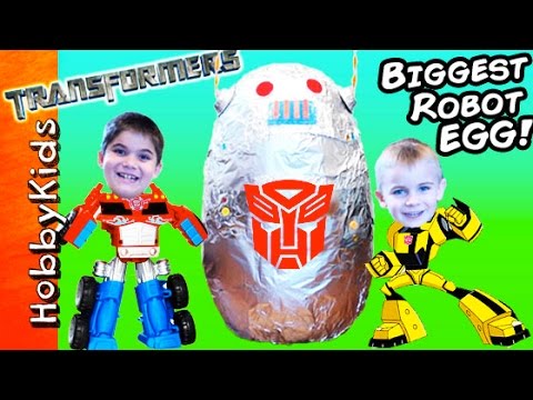 World's BIGGEST ROBOT Surprise Egg! Fighting Transformers + BEST Toys HobbyKidsTV