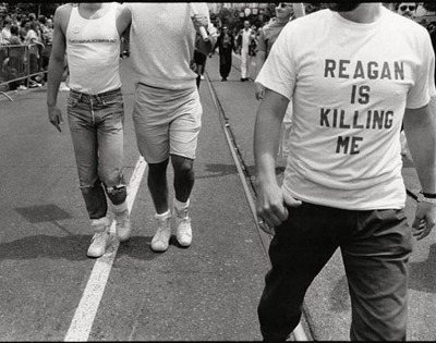 lgbt-history-archive:

“Reagan Is Killing Me,” Gay and Lesbian Freedom Day, San Francisco, California, June 28, 1987. Photo by Saul Bromberger &amp; Sandra Hoover. The first cases of AIDS in the United States were reported in 1981; President Ronald Reagan gave his first address on the subject on May 31, 1987, weeks before Pride celebrations took place across the country. By the end of 1987, over 40,000 people in the United States were dead from HIV/AIDS-related illness. #knowyourhistory (at Market Street San Fancisco)
