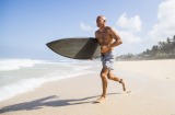 Kelly Slater hits the beach in Hawaii.