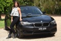 Neighbours actress Olympia Valance poses for a photo with her BMW 118i 