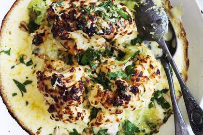 Whole cauliflower gratin with pickled celery and walnuts