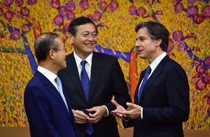 South Korean Vice Foreign Minister Lim Sung-Nam, left, chats with U.S. Deputy Secretary of State Tony Blinken, right, and Japanese Vice Foreign Minister Akitaka Saiki before a meeting with South Korean Foreign Minister Yun Byung-Se in Seoul Tuesday, April 19, 2016.