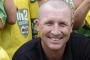 Enjoying retirement: Brad Haddin has a laugh with some junior cricketers.