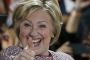 Democratic presidential candidate Hillary Clinton celebrates on stage after winning the New York state primary election.