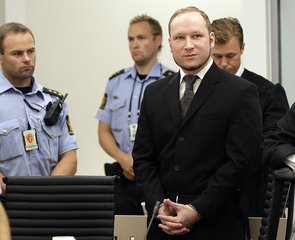 File - Mass murderer Anders Behring Breivik, arrives at the courtroom in a courthouse in Oslo Friday Aug. 24, 2012 .