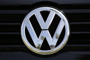 The Volkswagen logo is seen on car offered for sale at New Century Volkswagen dealership in Glendale, Calif., Monday, Sept. 21, 2015.