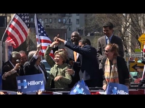 Hillary Clinton dances on stage with NY officials