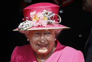 Britain's Queen Elizabeth II leaves after a visit to the Royal Mail Post Office in Windsor, England, Wednesday, April 20, 2016.