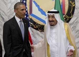 President Barack Obama and Saudi Arabia's King Salman stand together for the Leaders Photo at the Diriyah Palace during the Gulf Cooperation Council Summit in Riyadh, Saudi Arabia, Thursday, April 21, 2016.