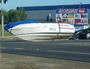 A boat is on the road on the Bruce Highway near Stockland Rockhampton following a single vehicle crash