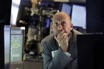 Specialist Meric Greenbaum works at his post on the floor of the New York Stock Exchange, after the the Federal Reserve announced its rate decision, Thursday, Sept. 17, 2015.