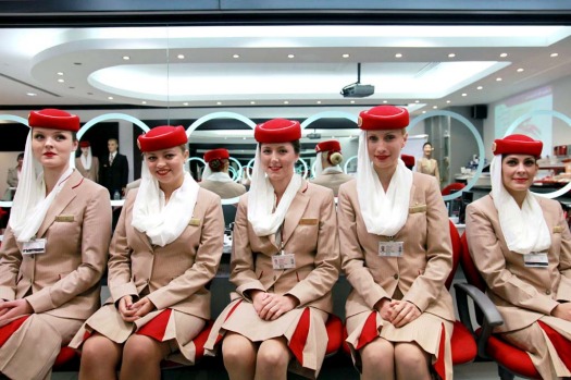 Photos: Inside Emirates' flight attendant school. Flight attendant students for Emirates pose in the image and uniform ...