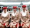 Flight attendant students for Emirates pose in the image and uniform classroom at the Emirates Aviation College in Dubai.